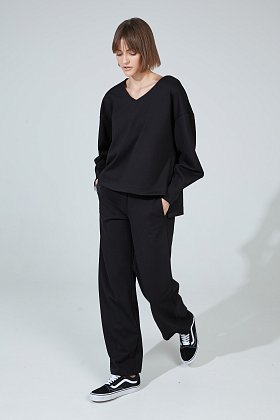 Фото модной одежды - монро брюки трикотаж черный сезон 2020 года